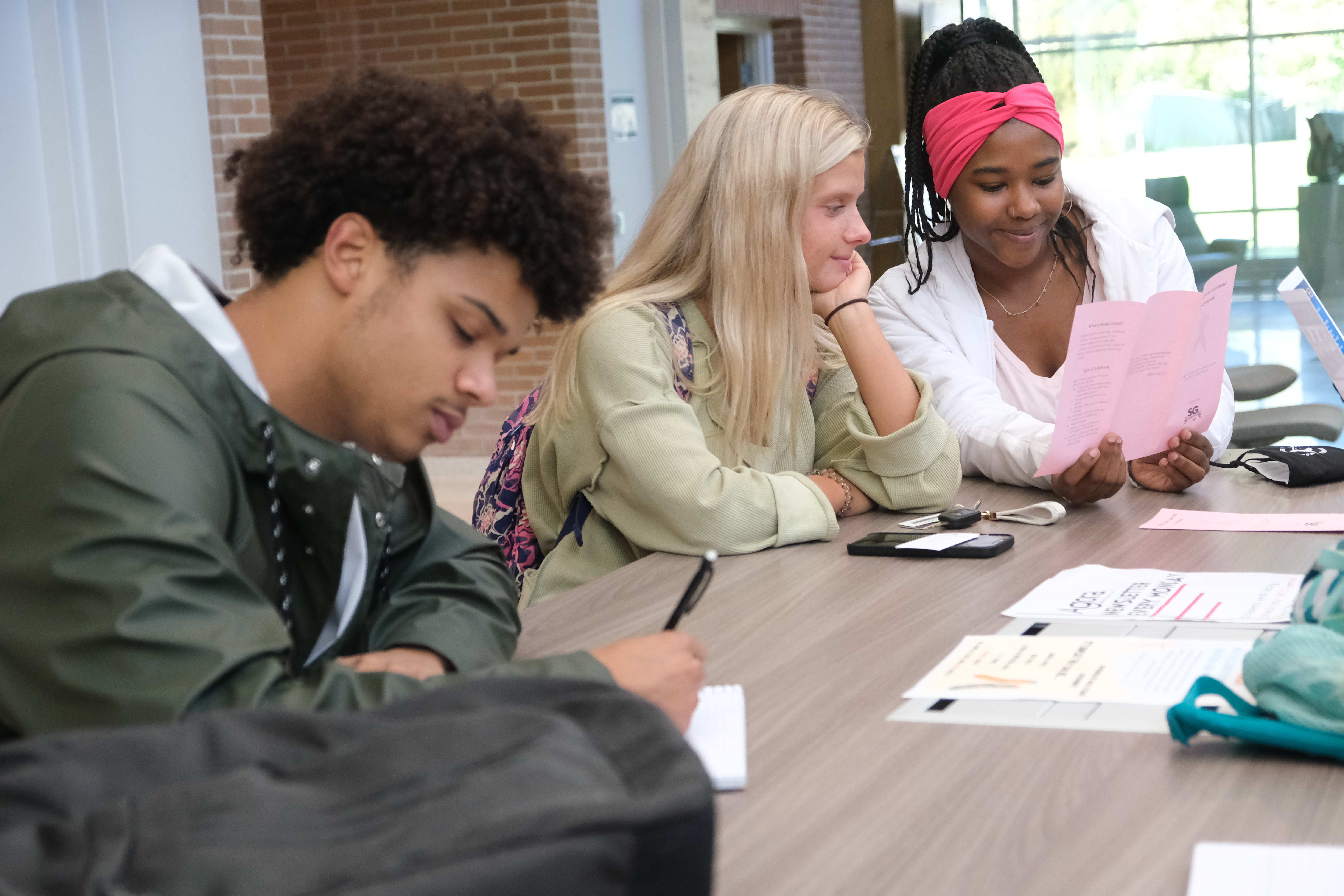 Three students in Founders Hall