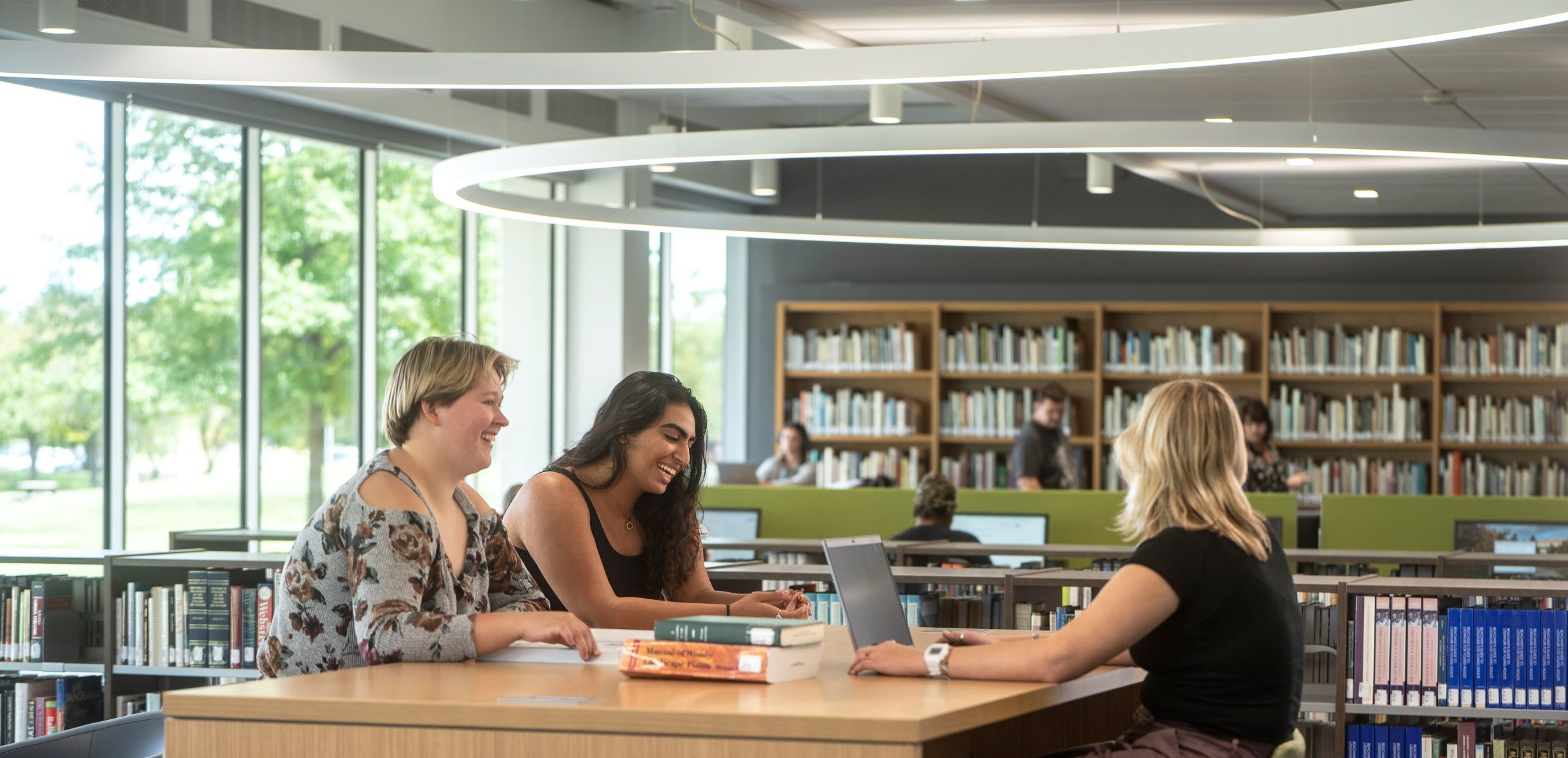 Three students in Library