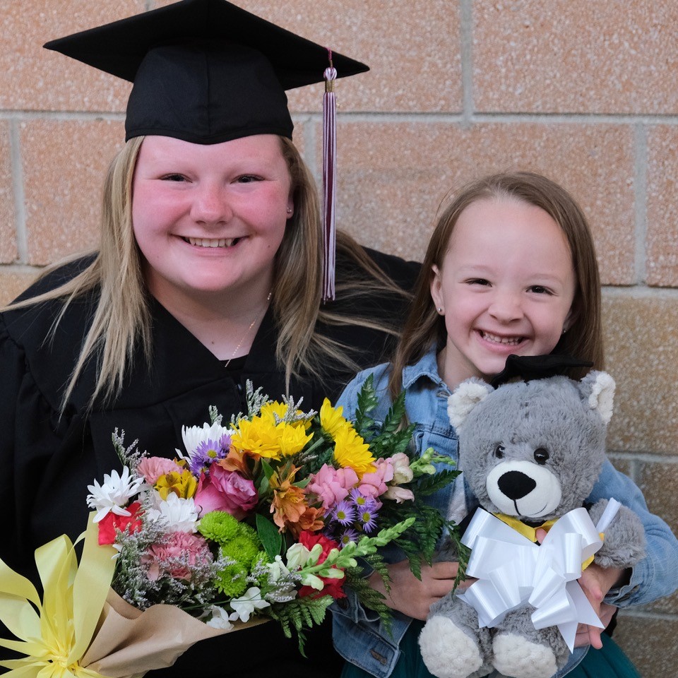 Graduate with child